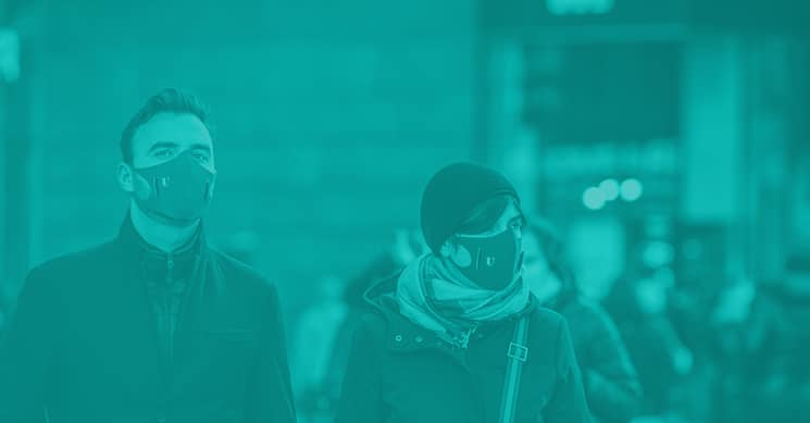 man and woman in mask representing covid 19