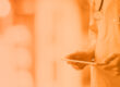 HHS CPG Checklist Feature - Orange monotone image of a medical professional